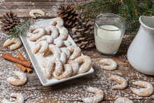 Vanille Cookies And Milk On A Wooden Table