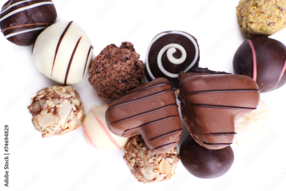 Group of sweet chocolate candies isolated on white background