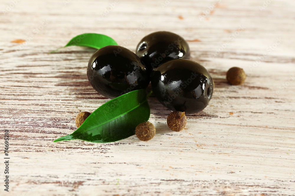 Tree black olives with leaf and peas
