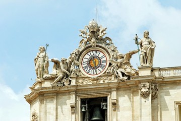 Wall Mural - Sculptures and clock on the facade of Vatican city works