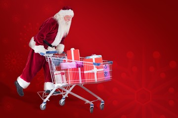 Poster - Composite image of santa rides on a shopping cart