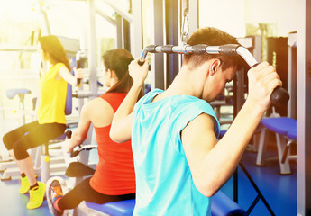 Sticker - Group of people training with weights in gym