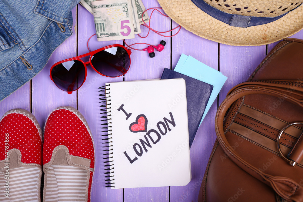 Travel things for traveling on wooden background top view