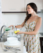 © JackF - Housewife washing dishes