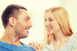 © Syda Productions - smiling happy couple at home