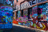 Fototapeta Młodzieżowe - Graffiti on walls in Graffiti Alley, Baltimore, Maryland.