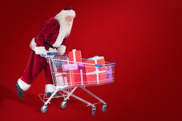 Poster - Composite image of santa rides on a shopping cart