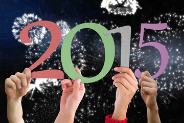 Aufkleber - Composite image of hands holding poster