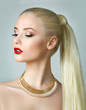 Beauty portrait of gorgeous blonde woman with ponytail