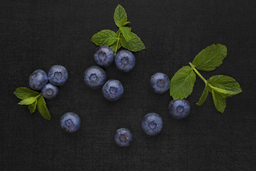 Sticker - Blueberries isolated on black background.