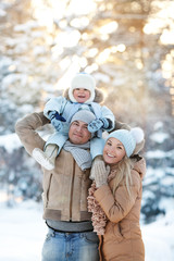 Wall Mural - Young Mother and Father with a child