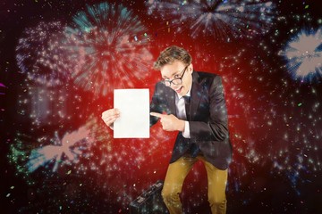 Poster - Composite image of young geeky businessman holding page