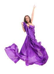 Wall Mural - female dancer in flying purple dress