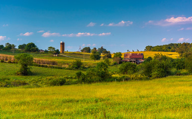 View of rolling hills and farm fields in rural Howard County, Ma