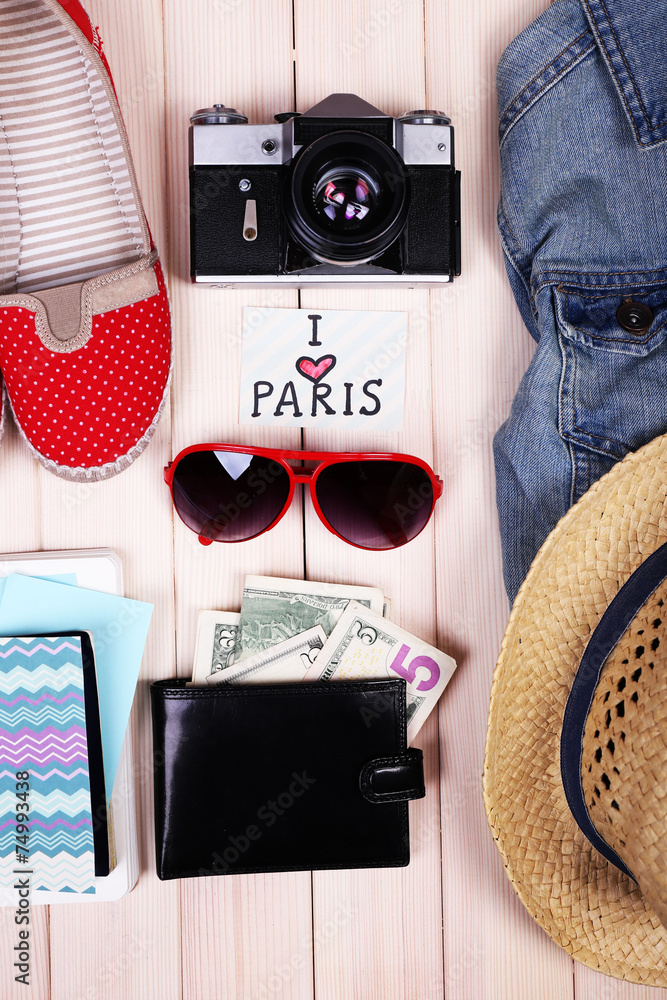 Travel things for traveling on wooden background top view