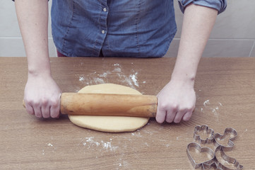 Wall Mural - Woman kneading, baking cookies, pizza or bread