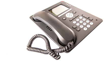 Modern desktop telephone over white background 