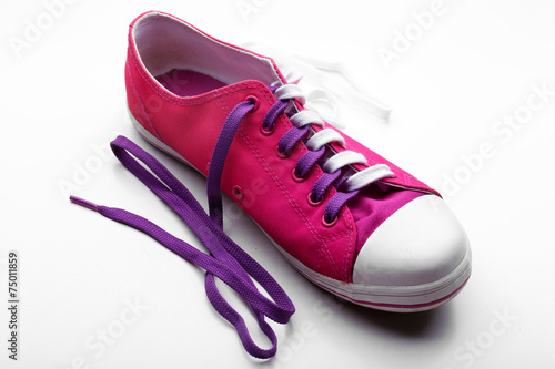 Fotografía Process of tying shoelace, isolated on white