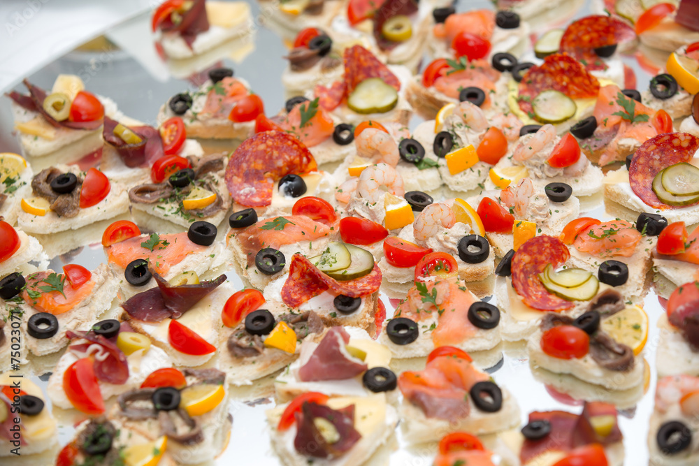 Different types of canapes on buffet table Stock Photo | Adobe Stock