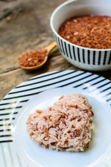 Brown rice on wooden table