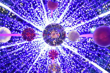 Christmas balls and blue bokeh space.