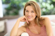 © goodluz - Portrait of attractive blond woman at home