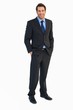© WavebreakmediaMicro - Smiling young businessman with hands in pockets