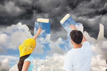 Poster - Composite image of happy young couple painting together