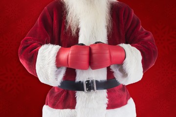 Poster - Composite image of santa claus wears boxing gloves