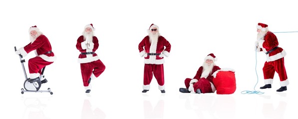 Poster - Composite image of different santas