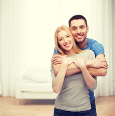 Wall Mural - smiling couple hugging