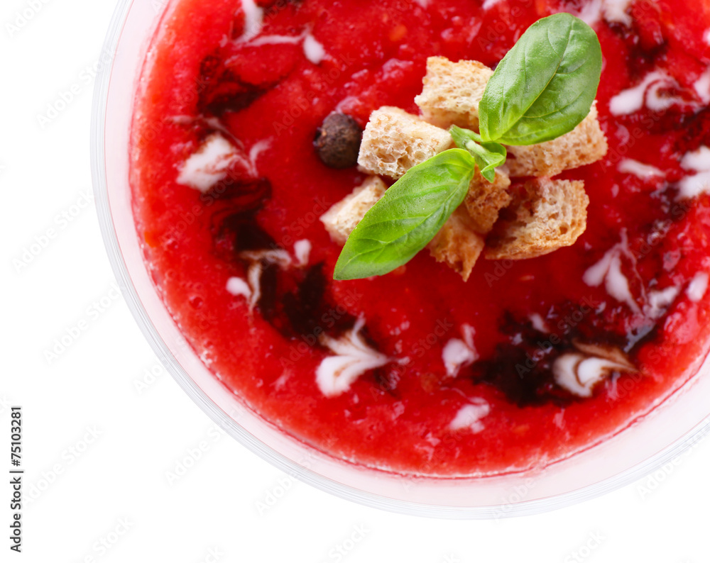 Gazpacho soup in glass bowl isolated on white
