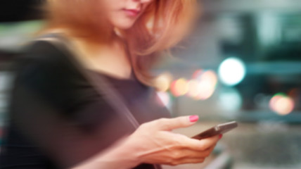 colorful woman use on mobile phone, soft and blur concept
