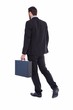 © WavebreakMediaMicro - Businessman walking while holding briefcase