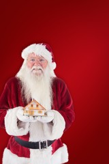 Aufkleber - Composite image of santa holds a tiny house in his hands
