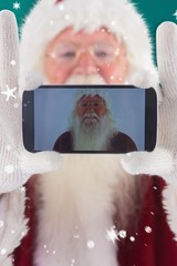 Aufkleber - Composite image of santa records himself with a smartphone