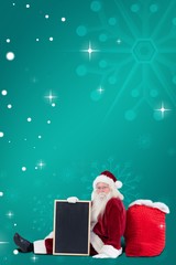 Aufkleber - Composite image of santa sits leaned on his bag with a board