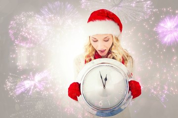 Aufkleber - Composite image of festive blonde holding large clock