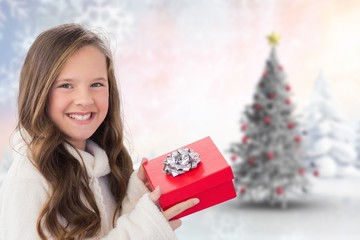 Poster - Composite image of girl holding gift