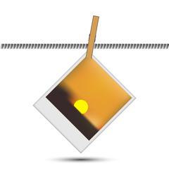 Wall Mural - Photo frame with a photo of autumn on clothespin
