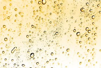 Wall Mural - water drops on glass with gold