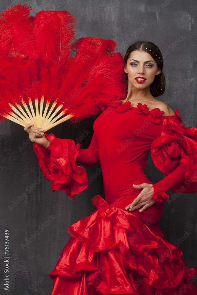 Woman traditional Spanish Flamenco dancer dancing in a red dress Stock  Photo | Adobe Stock