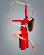 Plastic beautiful girl gymnast on acrobatic circus ring