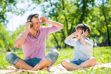 Wall Mural - Father and son in park