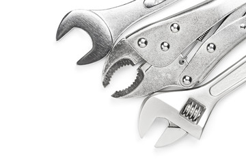 pliers, wrench, forceps on white background