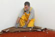 © sima - Home renovation, worker remove carpet from room floor