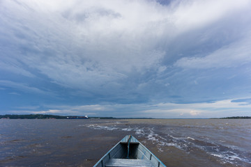 The Meeting of Waters (Portuguese: Encontro das Aguas) over boat