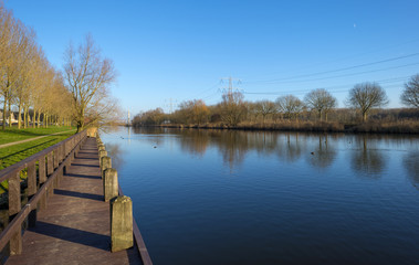  Jetty in a sunny canal in winter