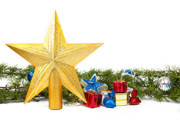 decoration with green pine or fir and many gifts and gold star f