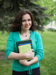 © lexmomot - Charming long-haired girl with book.